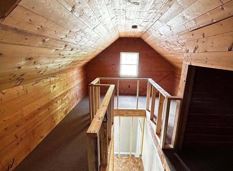 Loft railing and stair opening framed