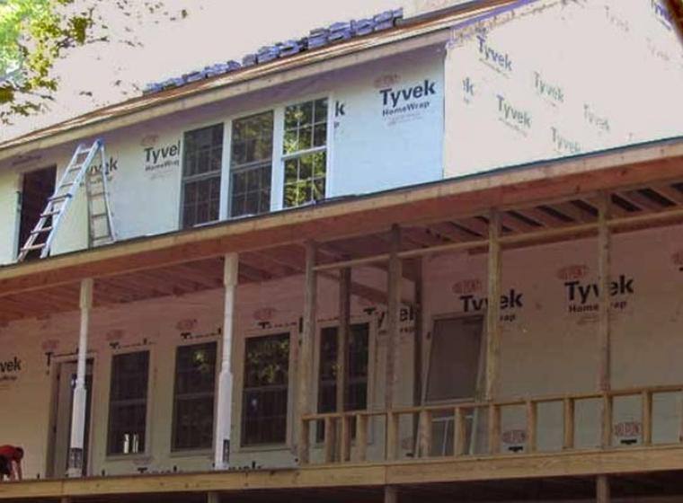 Two-story deck framing and house wrap
