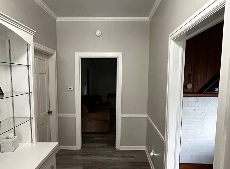Finished hallway with new trim, paint and flooring