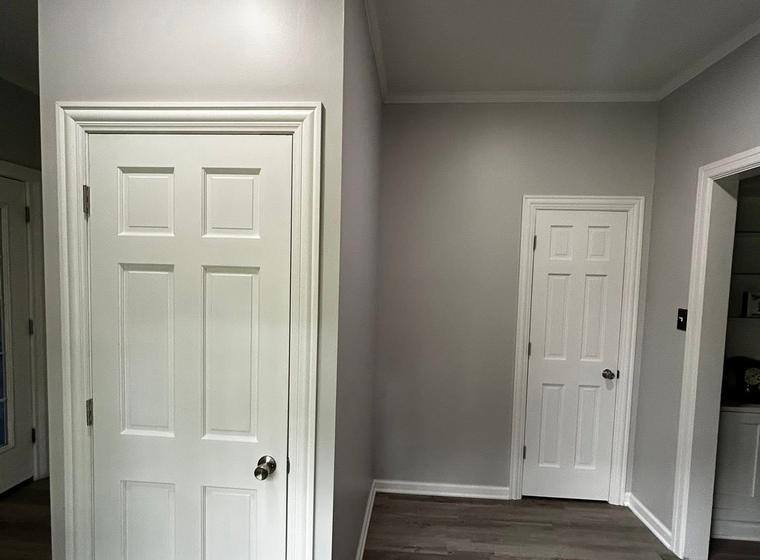 Finished staircase and trim built into an existing home by Marcum Construction